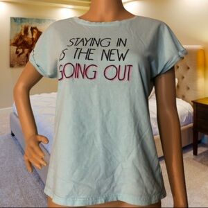 BE YOURSELF T-Shirt That Says “STAYING IN IS THE NEW GOING OUT”